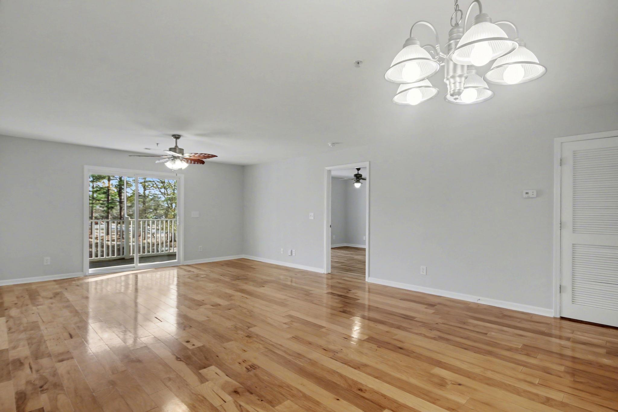 4853 Meadowsweet Drive, Unit 1807 Myrtle Beach, SC 29579 - Photo 18 of 40 Living room with access to screen porch