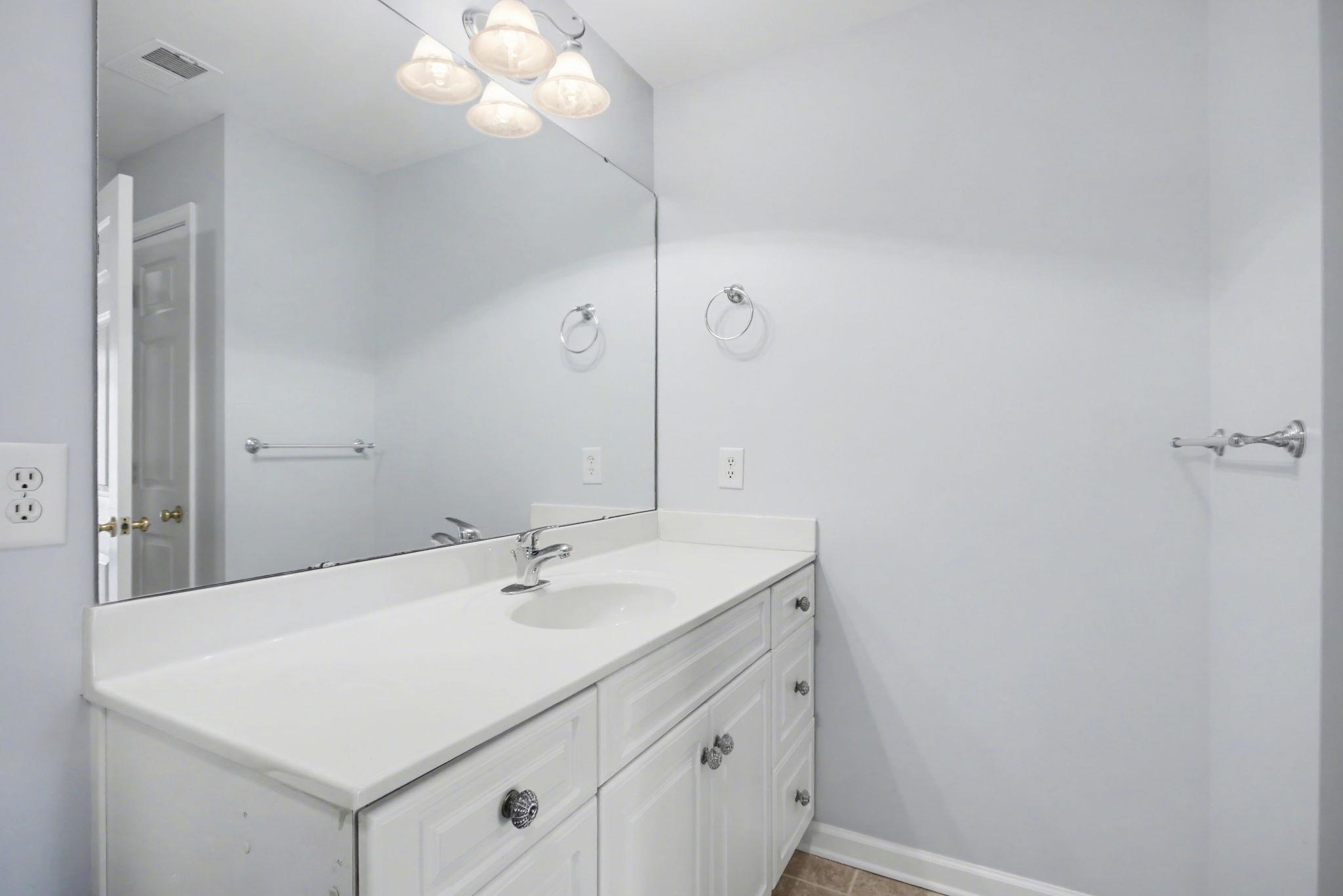 4853 Meadowsweet Drive, Unit 1807 Myrtle Beach, SC 29579 - Photo 26 of 40 Primary bathroom with vanity and walk in shower