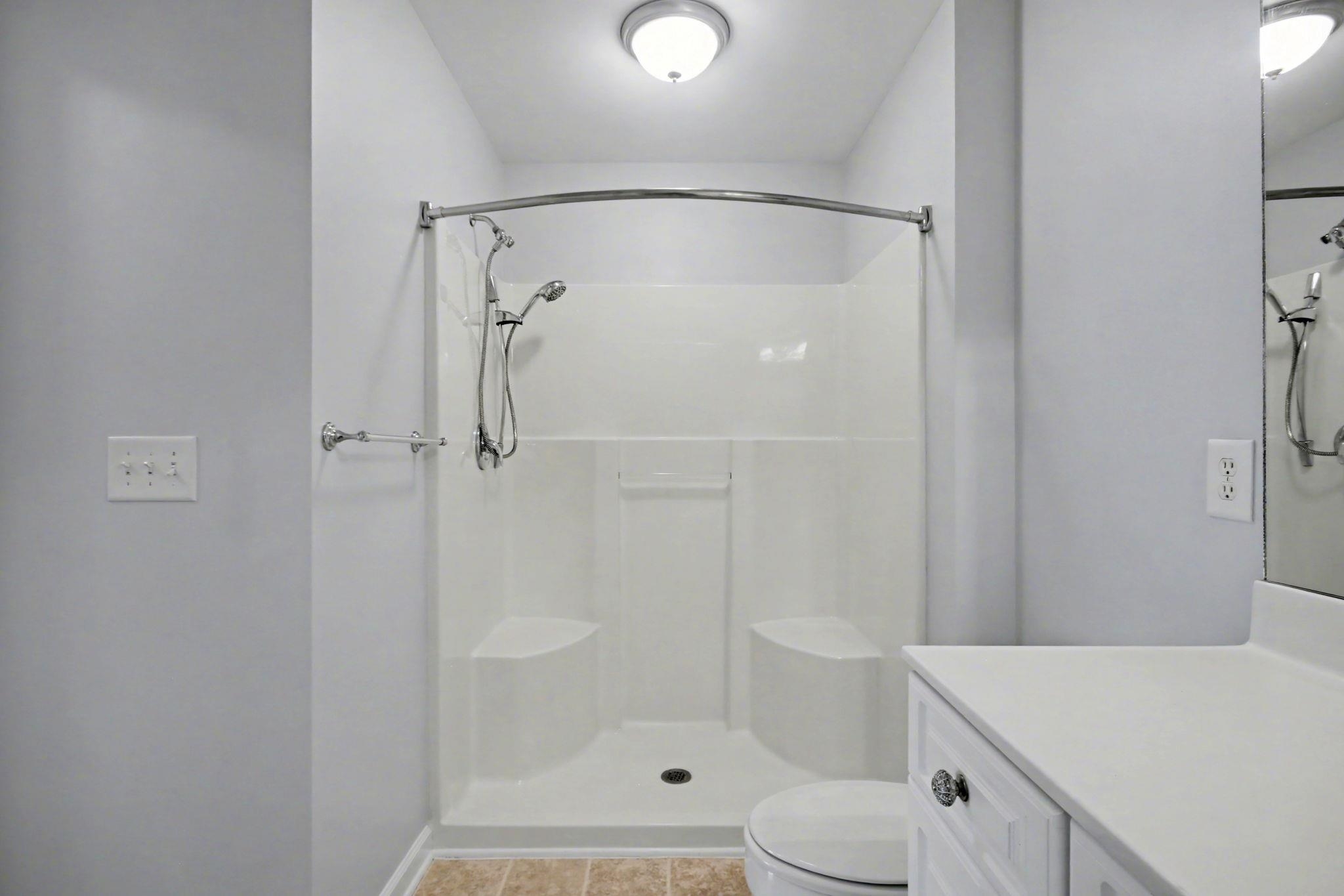4853 Meadowsweet Drive, Unit 1807 Myrtle Beach, SC 29579 - Photo 27 of 40 Primary bathroom featuring a vanity and walk in shower