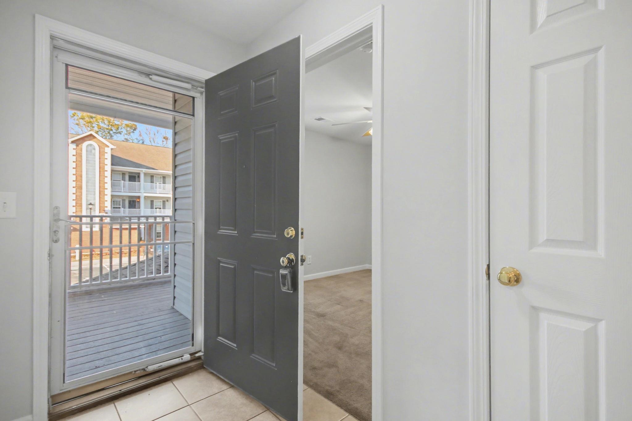 4853 Meadowsweet Drive, Unit 1807 Myrtle Beach, SC 29579 - Photo 4 of 40 Entrance foyer with storm door