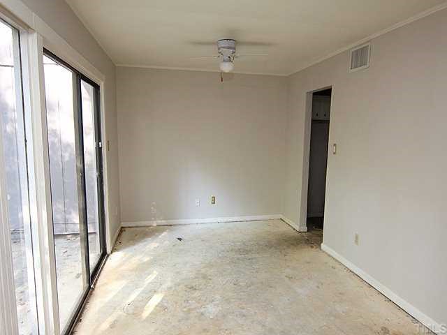 1764 Quail Ridge Road Raleigh, NC 27609 - Photo 6 of 10 an empty room with window