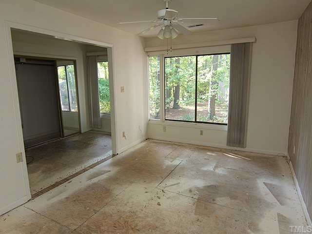 1764 Quail Ridge Road Raleigh, NC 27609 - Photo 7 of 10 a view of an empty room with a window