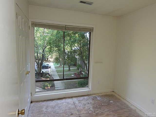 1764 Quail Ridge Road Raleigh, NC 27609 - Photo 9 of 10 a view of a room with sliding glass door