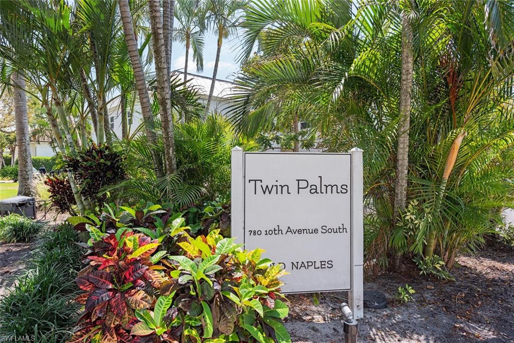 780 10th Avenue South, Unit 23 Naples, FL 34102 - Photo 4 of 15 a sign on the side of the tree