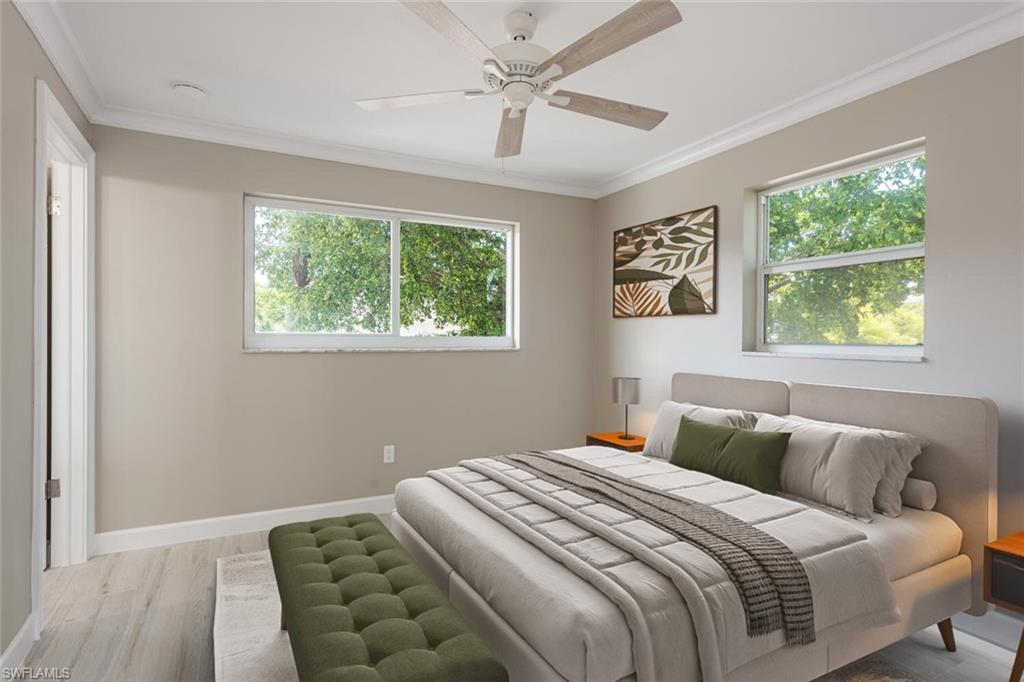 780 10th Avenue South, Unit 23 Naples, FL 34102 - Photo 7 of 15 a bedroom with bed and a window