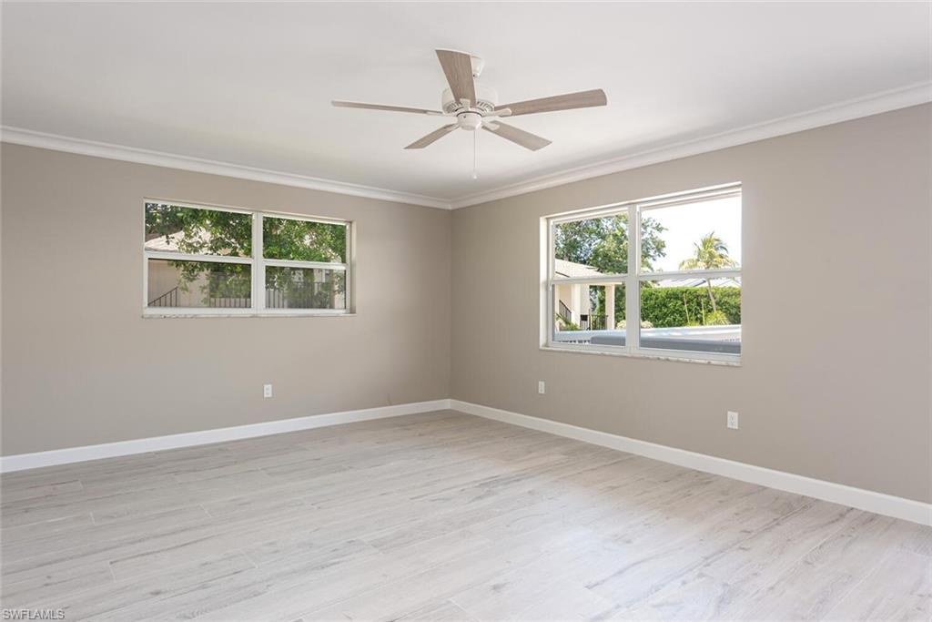 780 10th Avenue South, Unit 23 Naples, FL 34102 - Photo 9 of 15 a view of a livingroom with a window