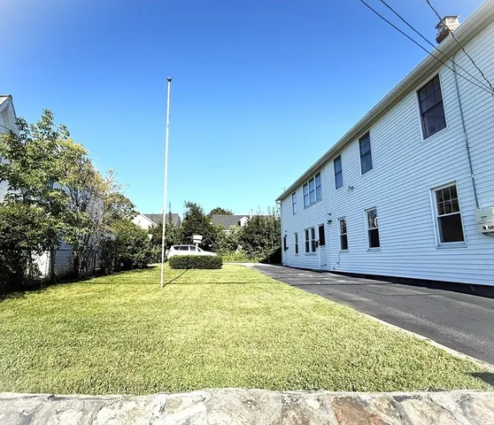 a view of a house with a big yard