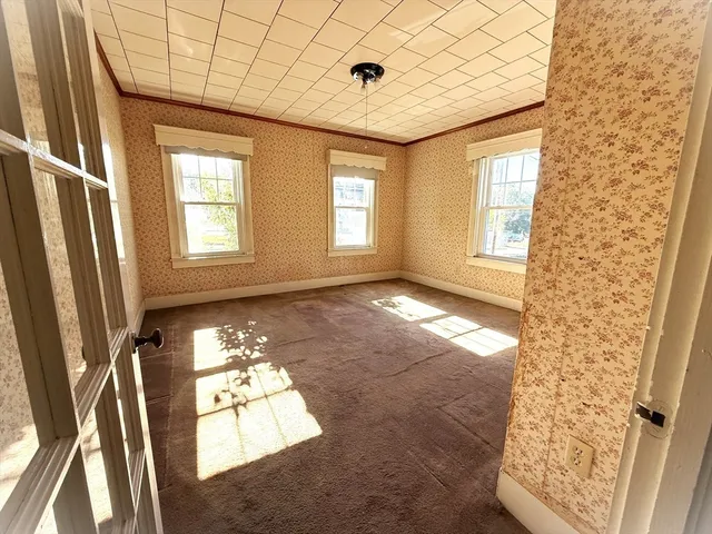 a view of entryway with a front door