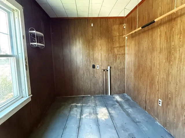 a view of a bathroom with a shower and a sink