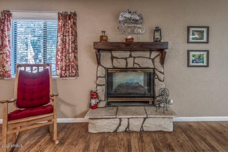 8475 Fossil Creek Road Strawberry, AZ 85544 - Photo 9 of 26 Family Room Fireplace