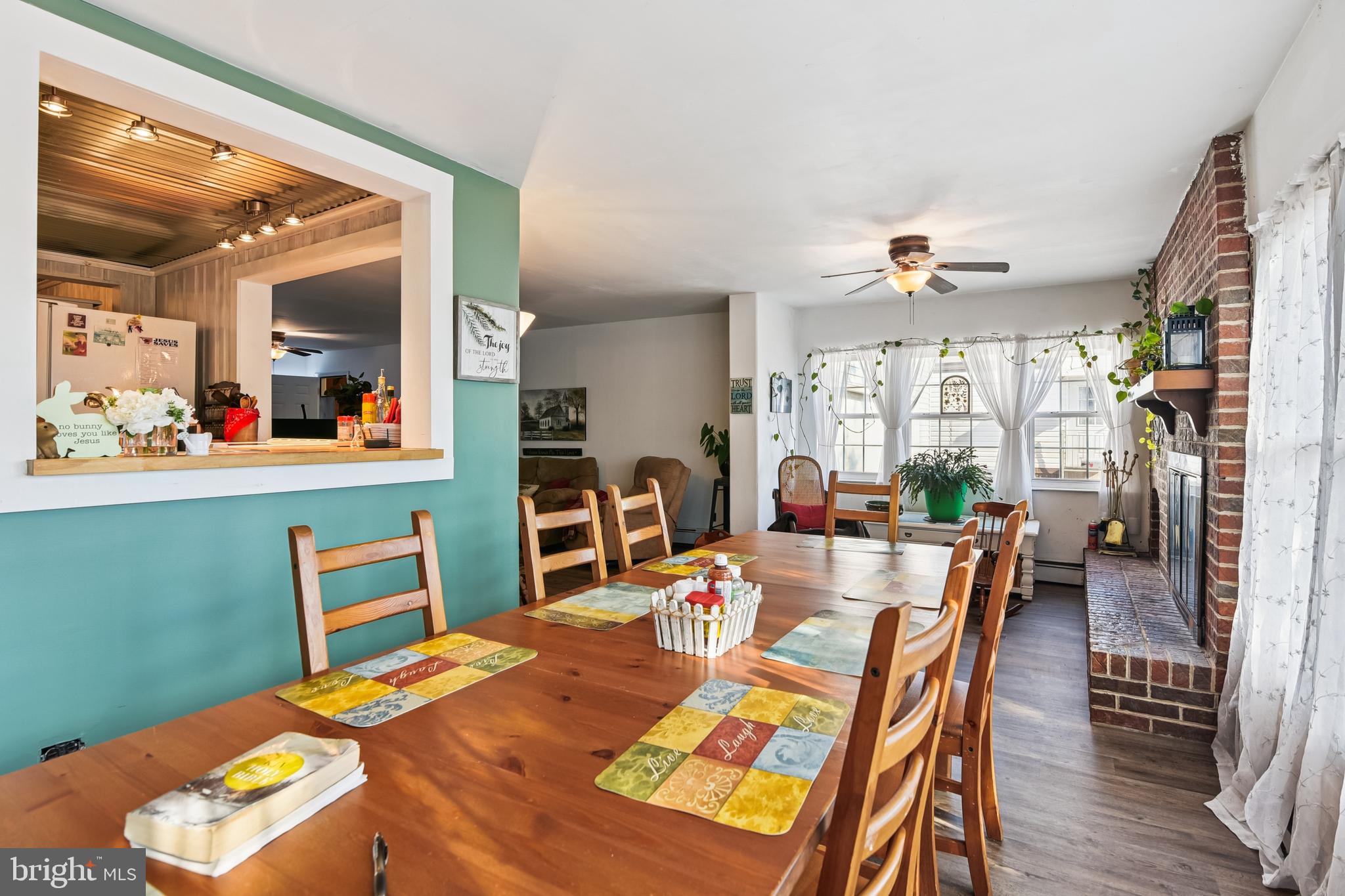 9266 Sharptown Road Laurel, DE 19956 - Photo 14 of 34 a view of a dining room with furniture window and wooden floor