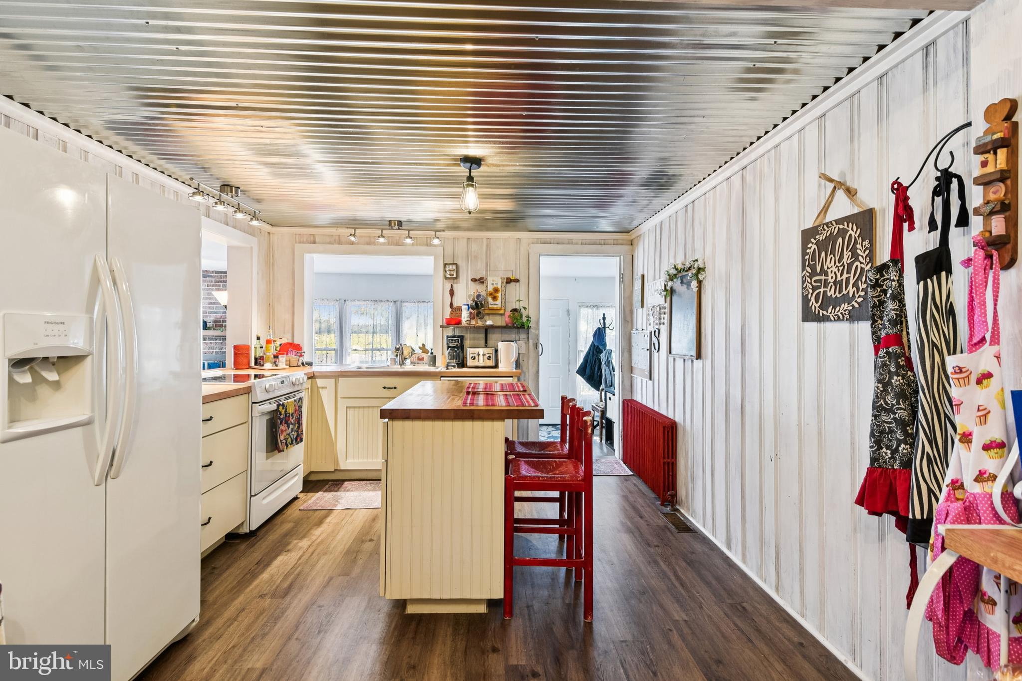 9266 Sharptown Road Laurel, DE 19956 - Photo 15 of 34 a kitchen with stainless steel appliances granite countertop a refrigerator and a stove