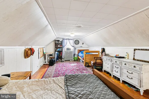 a bed room with a bed and a couch