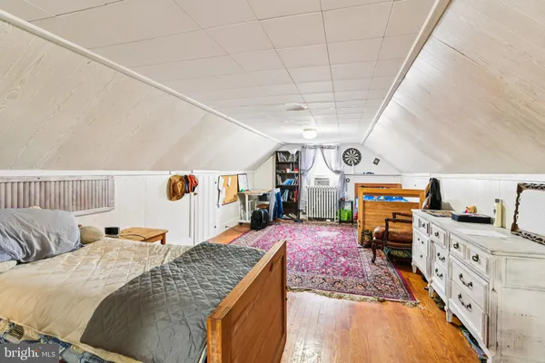 a bed room with bed and balcony