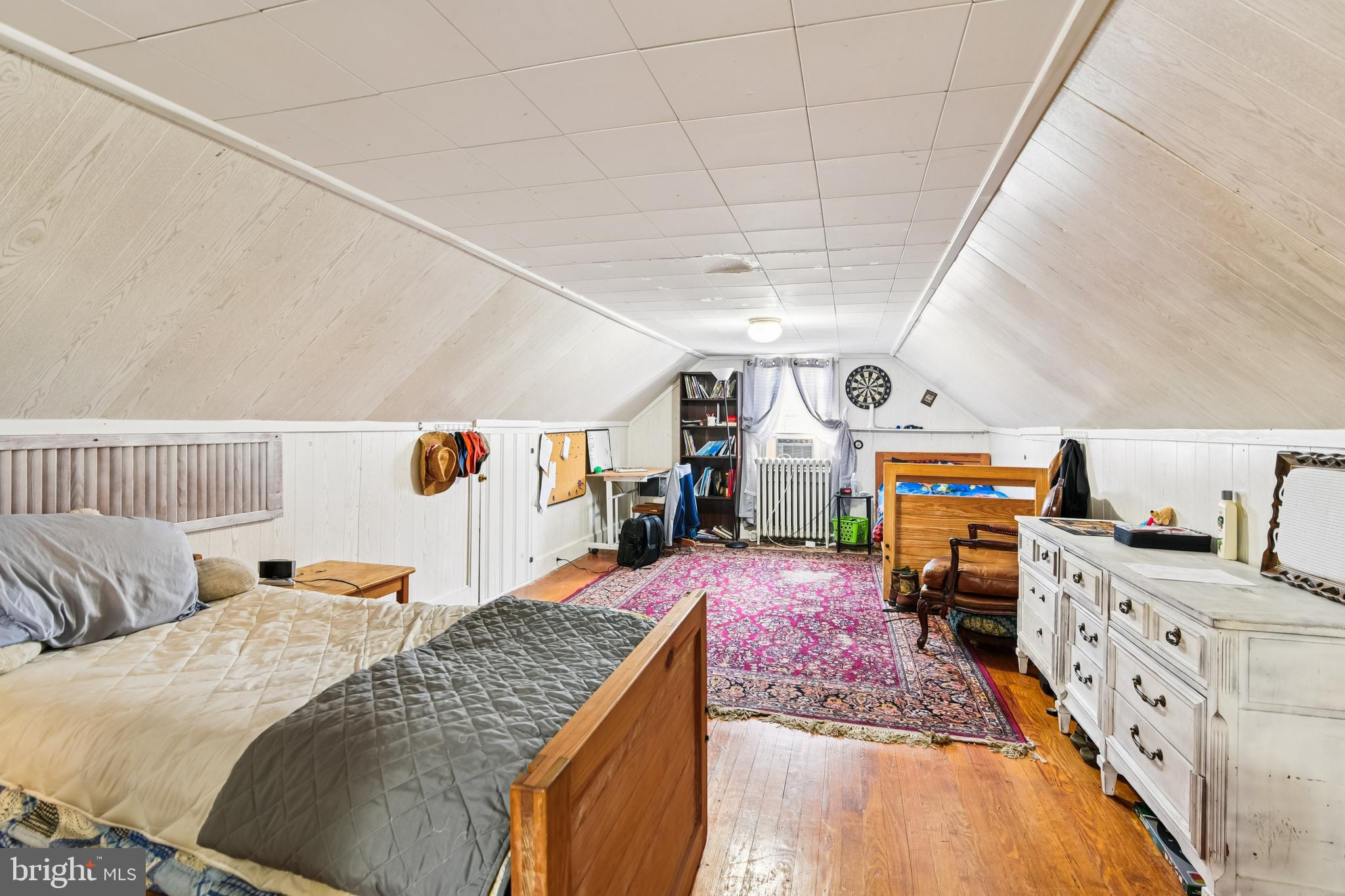 9266 Sharptown Road Laurel, DE 19956 - Photo 28 of 34 a bed room with a bed and a couch