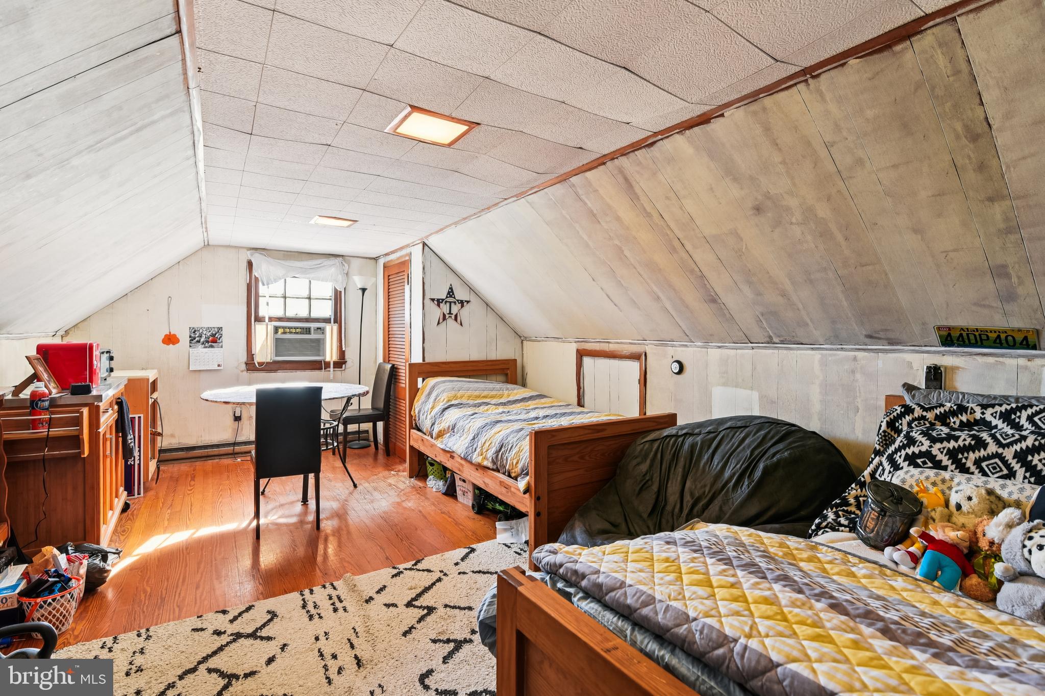 9266 Sharptown Road Laurel, DE 19956 - Photo 30 of 34 a bedroom with a bed and a table