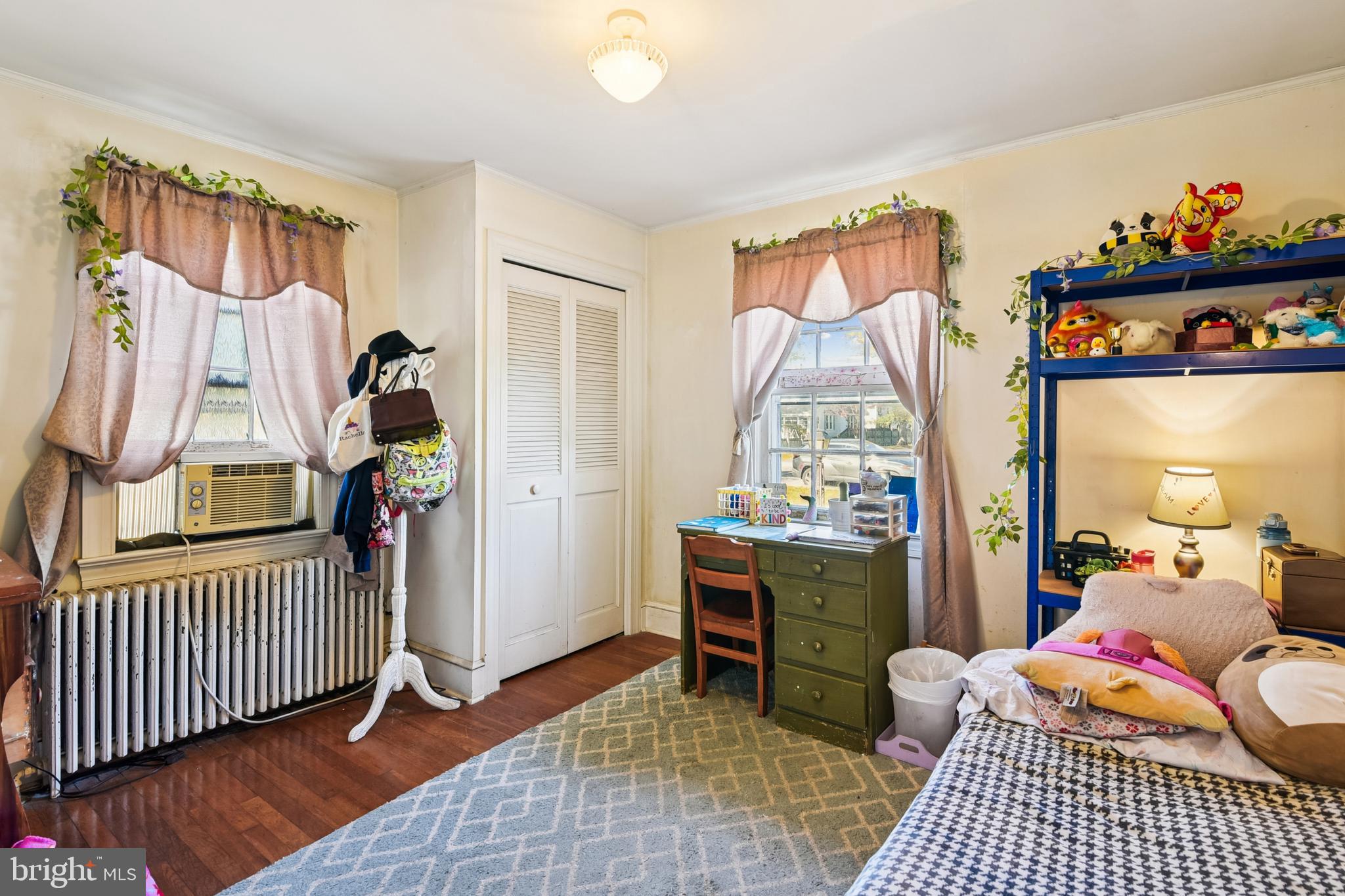 9266 Sharptown Road Laurel, DE 19956 - Photo 32 of 34 a view of a bedroom with baby crib and windows