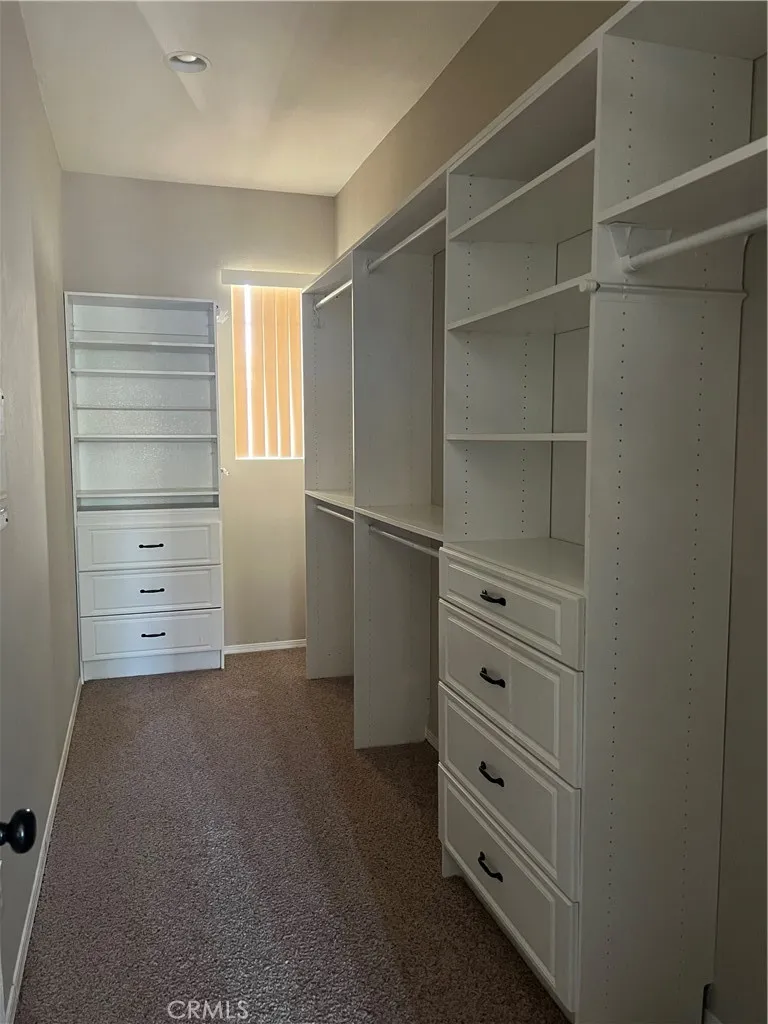 7161 East Avenue, Unit 104 Rancho Cucamonga, CA 91730 - Photo 13 of 18 a view of walk in closet