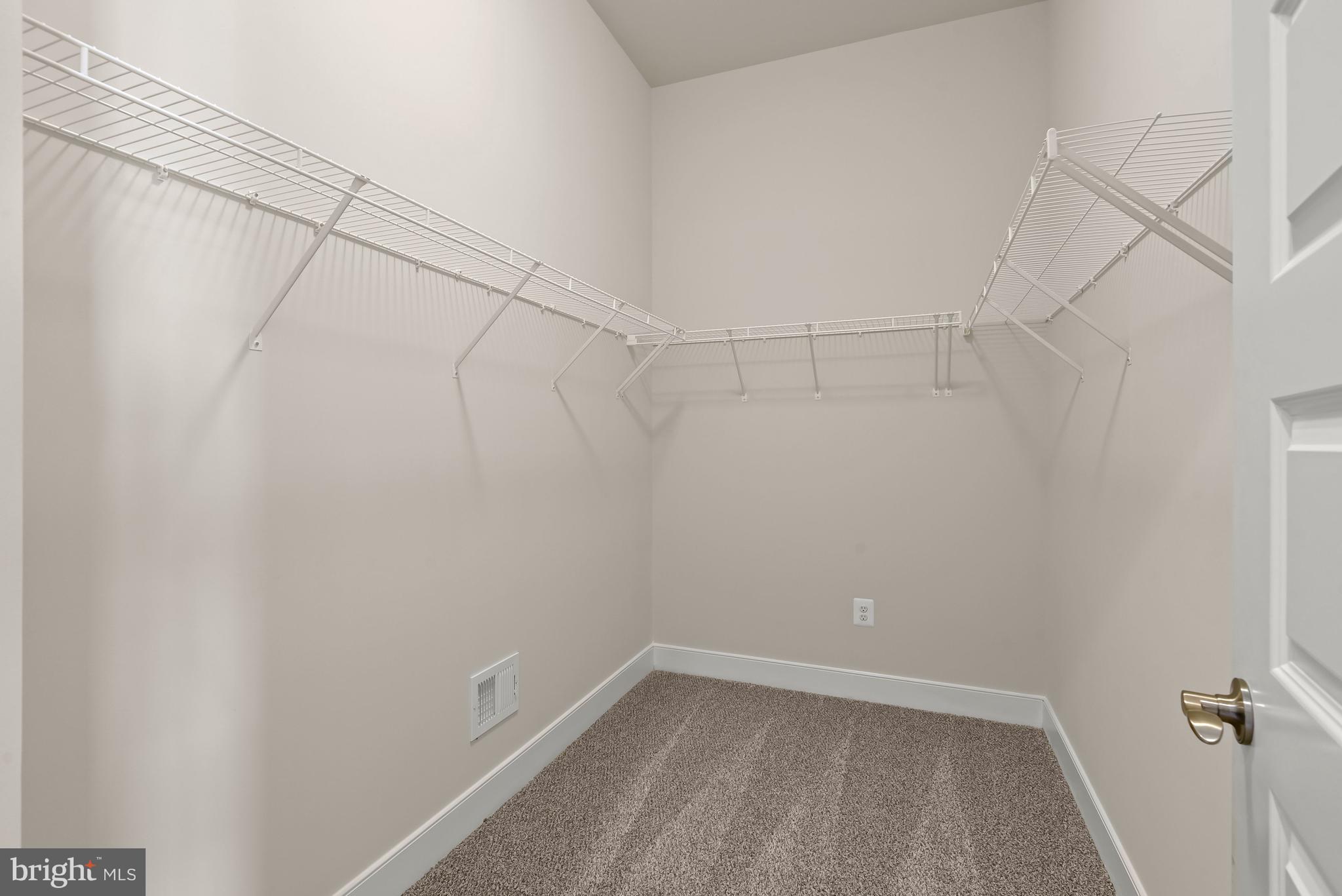 2844 Water Strider Way Odenton, MD 21113 - Photo 21 of 66 Primary Bedroom Suite Walk-In Closet