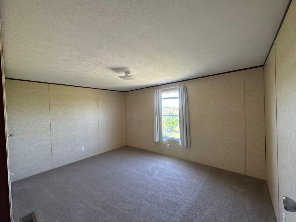 538 Cottle Town Road Smithville, TX 78957 - Photo 18 of 38 a view of an empty room with a window