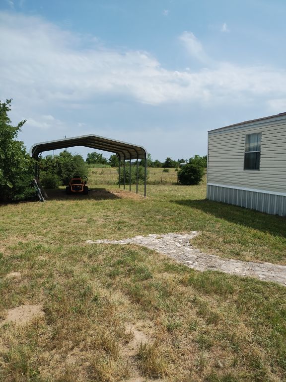538 Cottle Town Road Smithville, TX 78957 - Photo 5 of 38 a view of a backyard