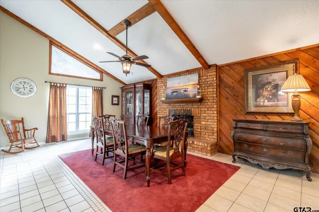 a bathroom with a sink a mirror and a lamp