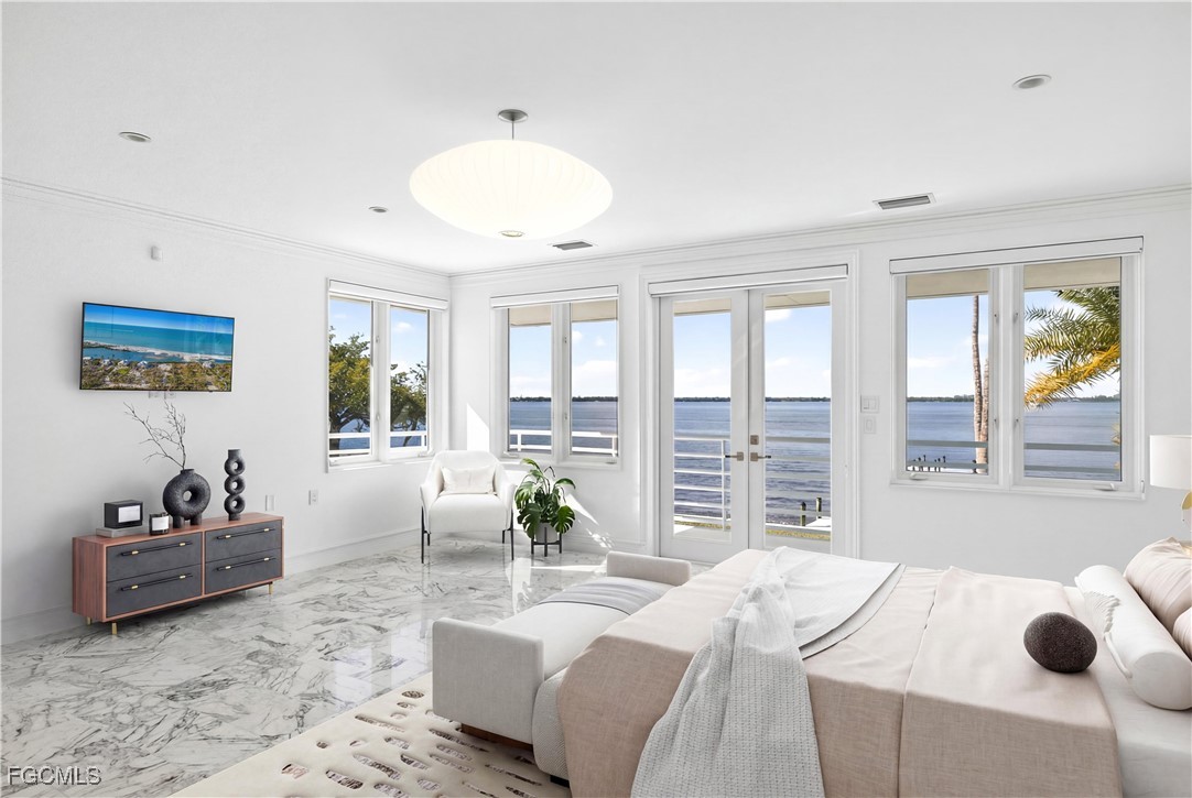 3402 West Riverside Drive Fort Myers, FL 33901 - Photo 23 of 50 a living room with furniture and a large window