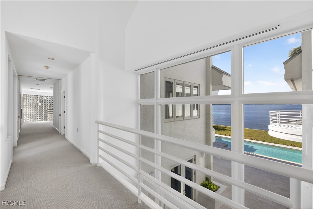 3402 West Riverside Drive Fort Myers, FL 33901 - Photo 26 of 50 a view of a bedroom with furniture and window