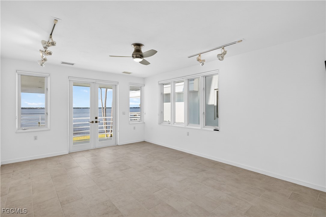 3402 West Riverside Drive Fort Myers, FL 33901 - Photo 31 of 50 a view of an empty room with a window