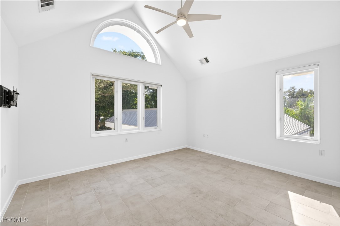 3402 West Riverside Drive Fort Myers, FL 33901 - Photo 34 of 50 an empty room with a window