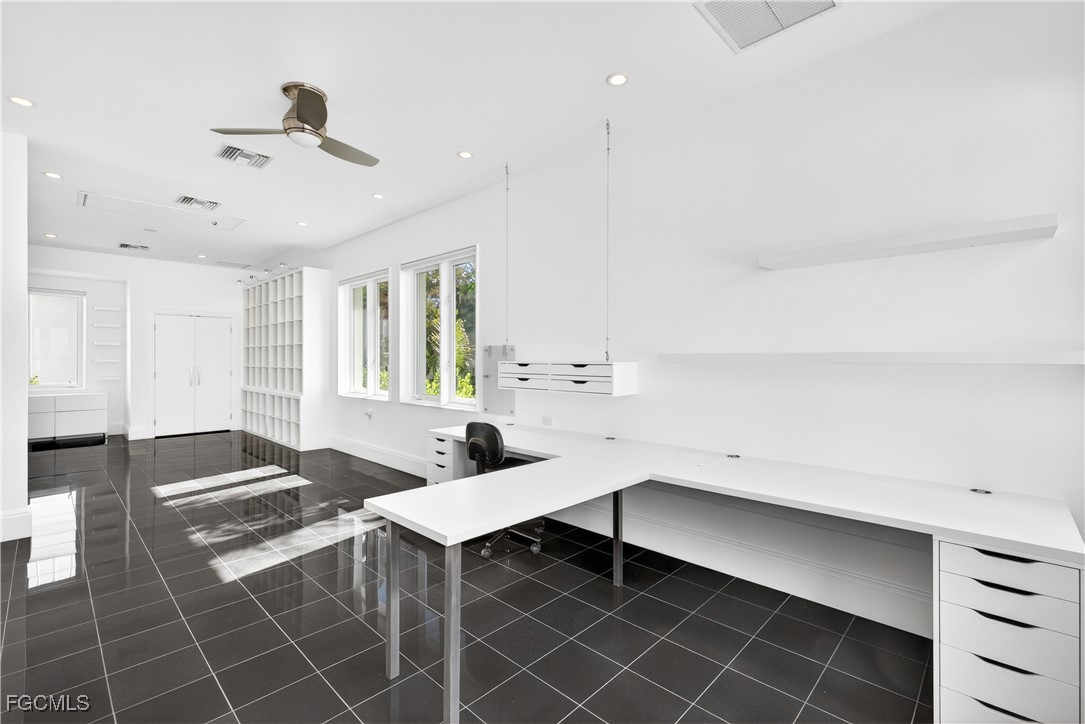 3402 West Riverside Drive Fort Myers, FL 33901 - Photo 37 of 50 a living room with furniture and wooden floor