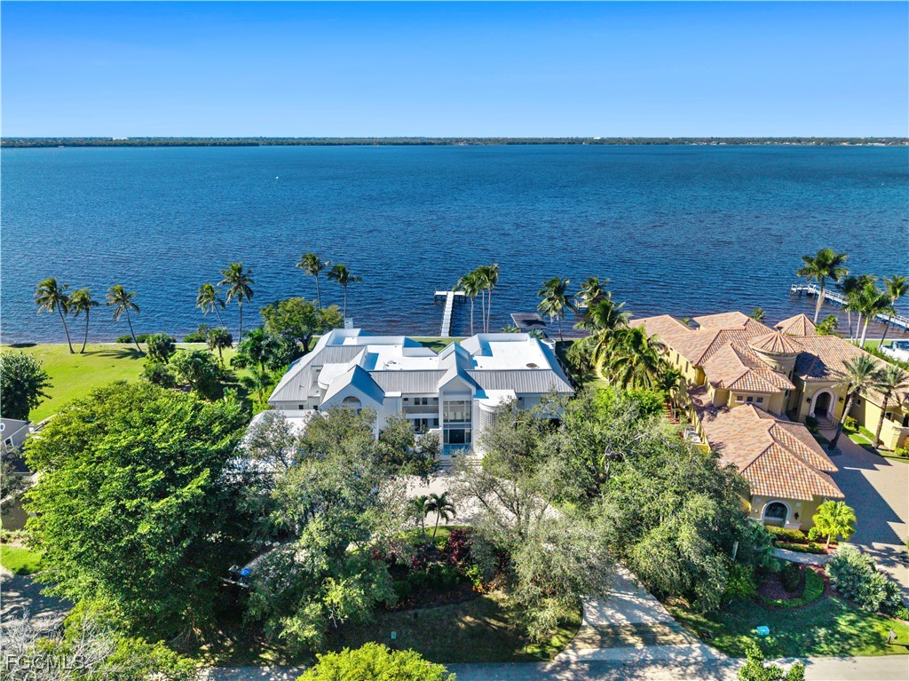 3402 West Riverside Drive Fort Myers, FL 33901 - Photo 50 of 50 an aerial view of a house with a garden