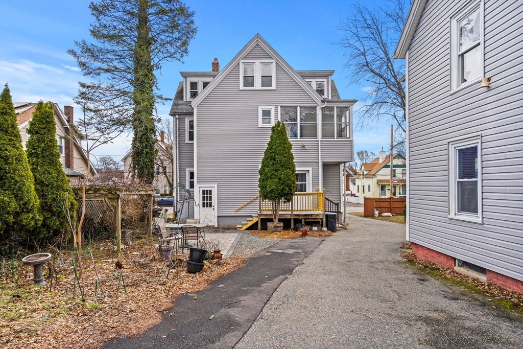 76 Myrtle Street Lynn, MA 01905 - Photo 23 of 27 a view of a house with sitting area and covered with snow in the background