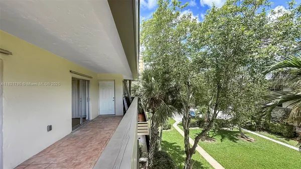 wooden floor in a backyard of a house