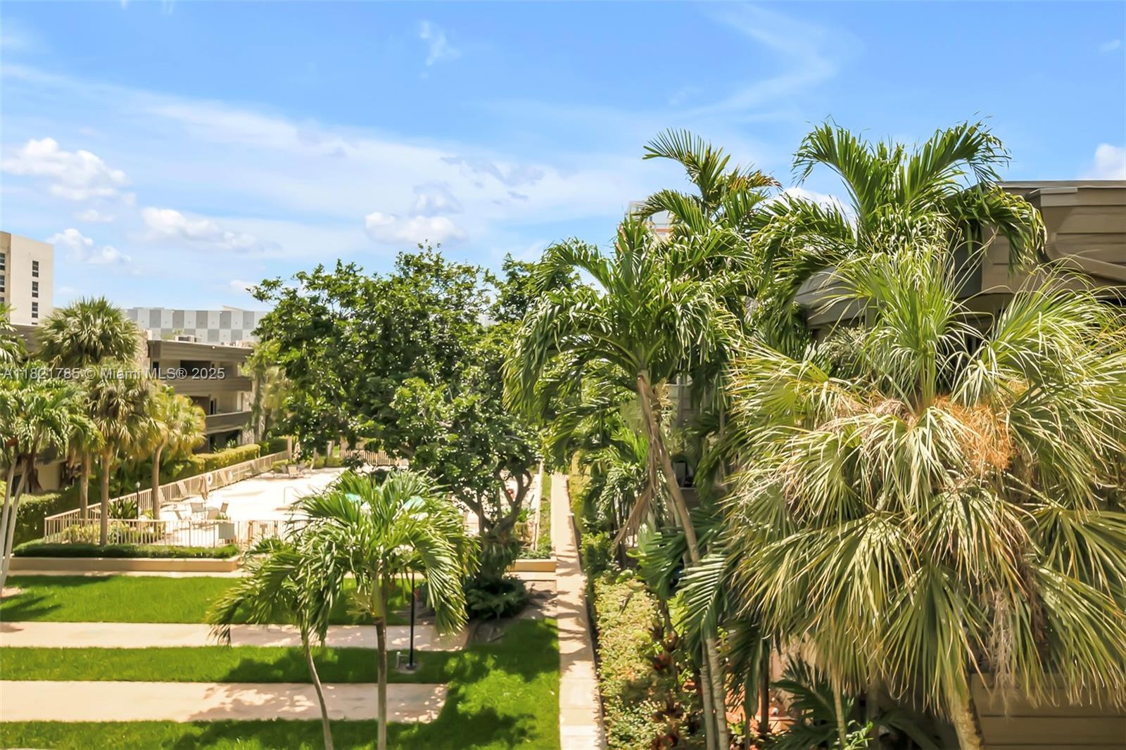8335 Southwest 72nd Avenue, Unit 315D Miami, FL 33143 - Photo 14 of 28 a view of a yard with plants and trees
