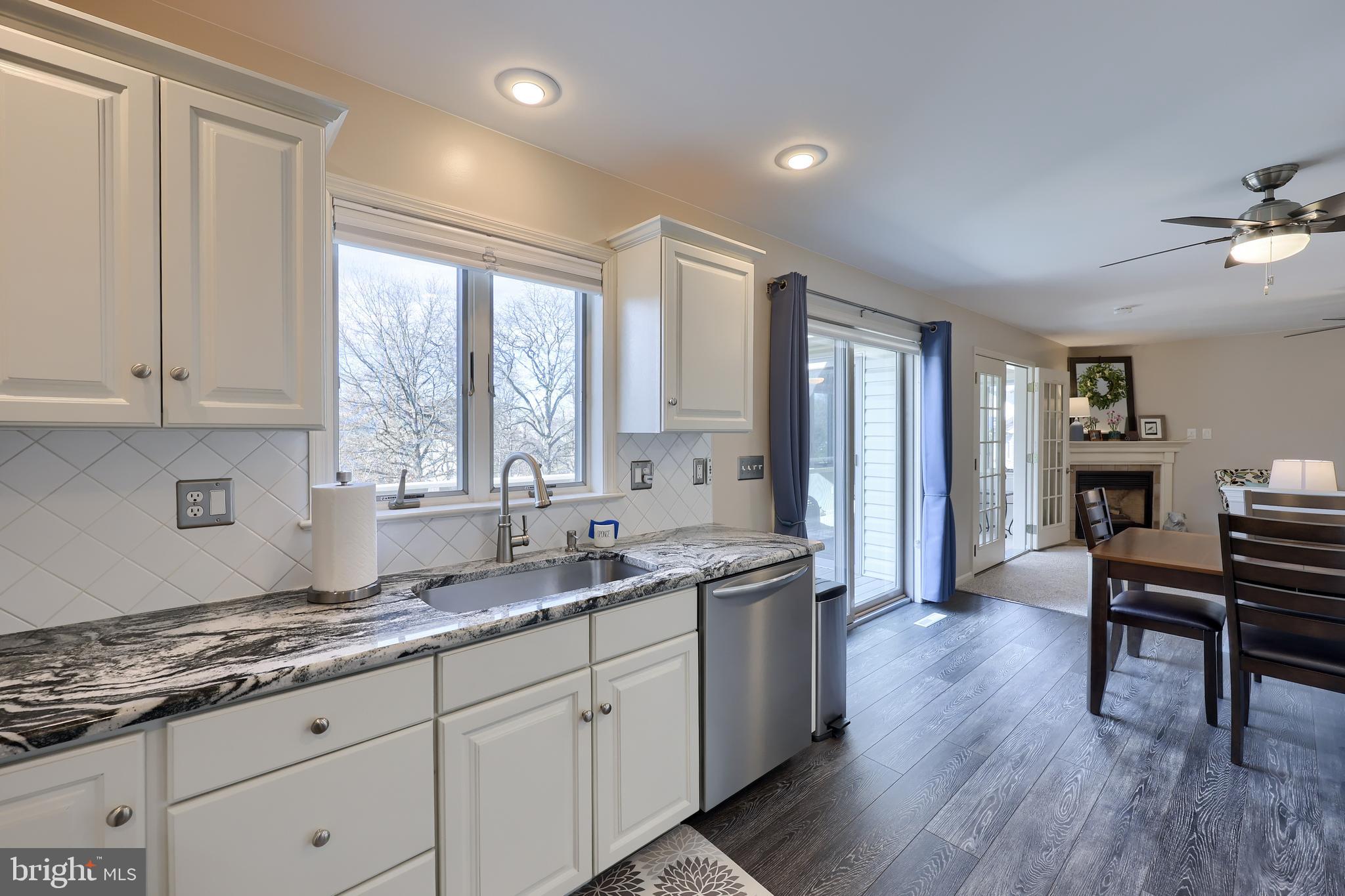 35 Field Lane Lititz, PA 17543 - Photo 19 of 49 a kitchen with sink cabinets and wooden floor