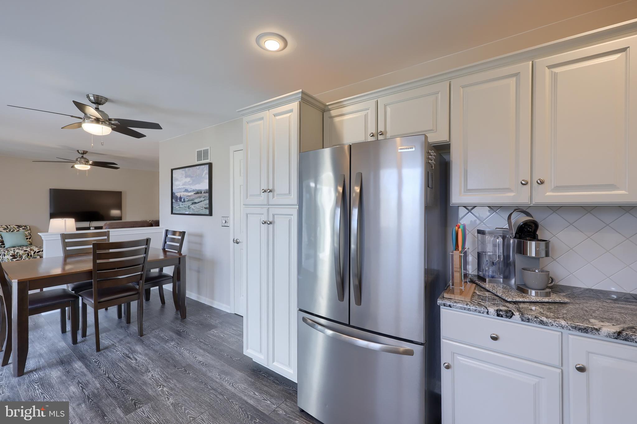 35 Field Lane Lititz, PA 17543 - Photo 20 of 49 a kitchen with stainless steel appliances granite countertop a refrigerator and a stove top oven