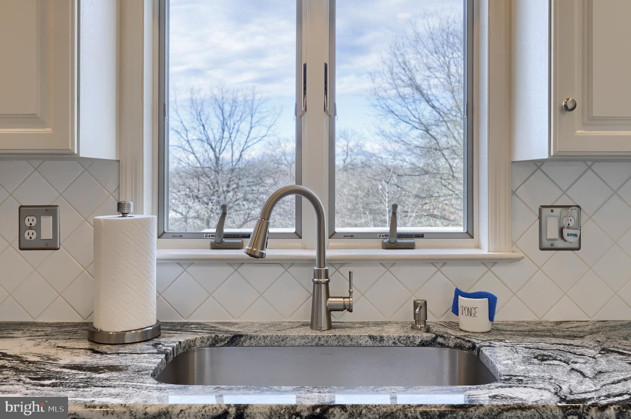 35 Field Lane Lititz, PA 17543 - Photo 21 of 49 a kitchen with a sink and a granite top