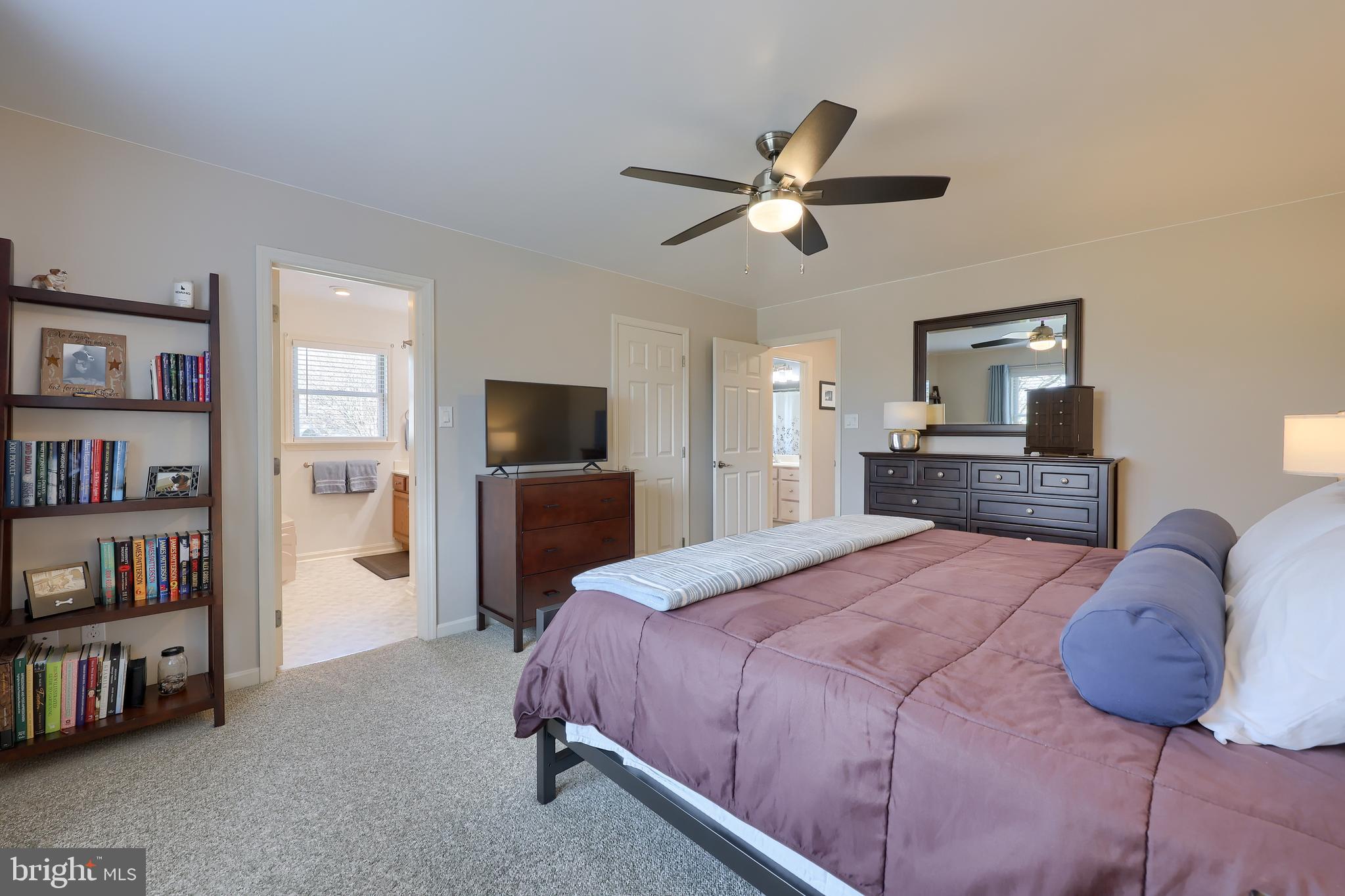 35 Field Lane Lititz, PA 17543 - Photo 32 of 49 a bedroom with a bed and a book shelf