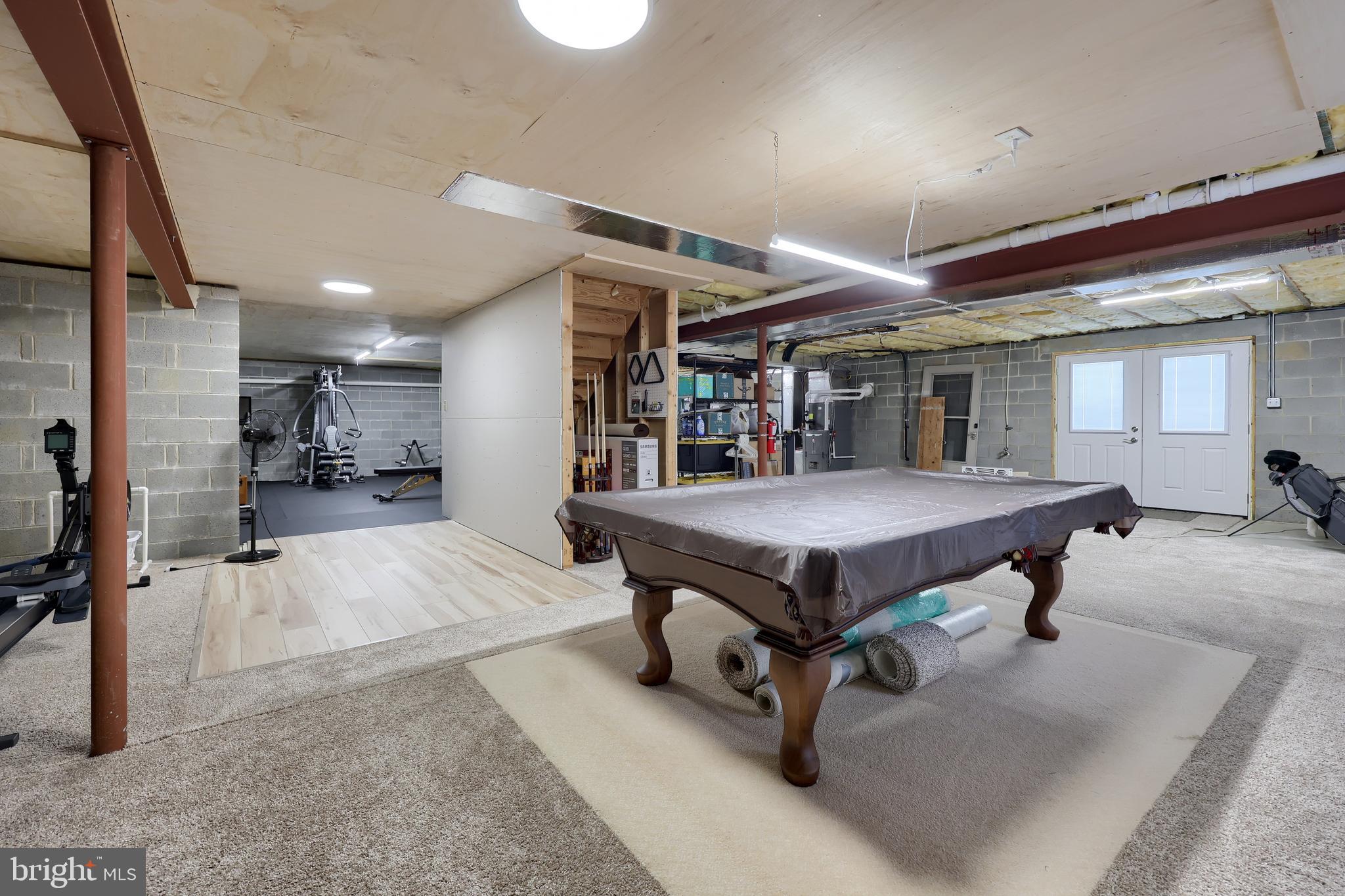 35 Field Lane Lititz, PA 17543 - Photo 37 of 49 a room with pool table and windows