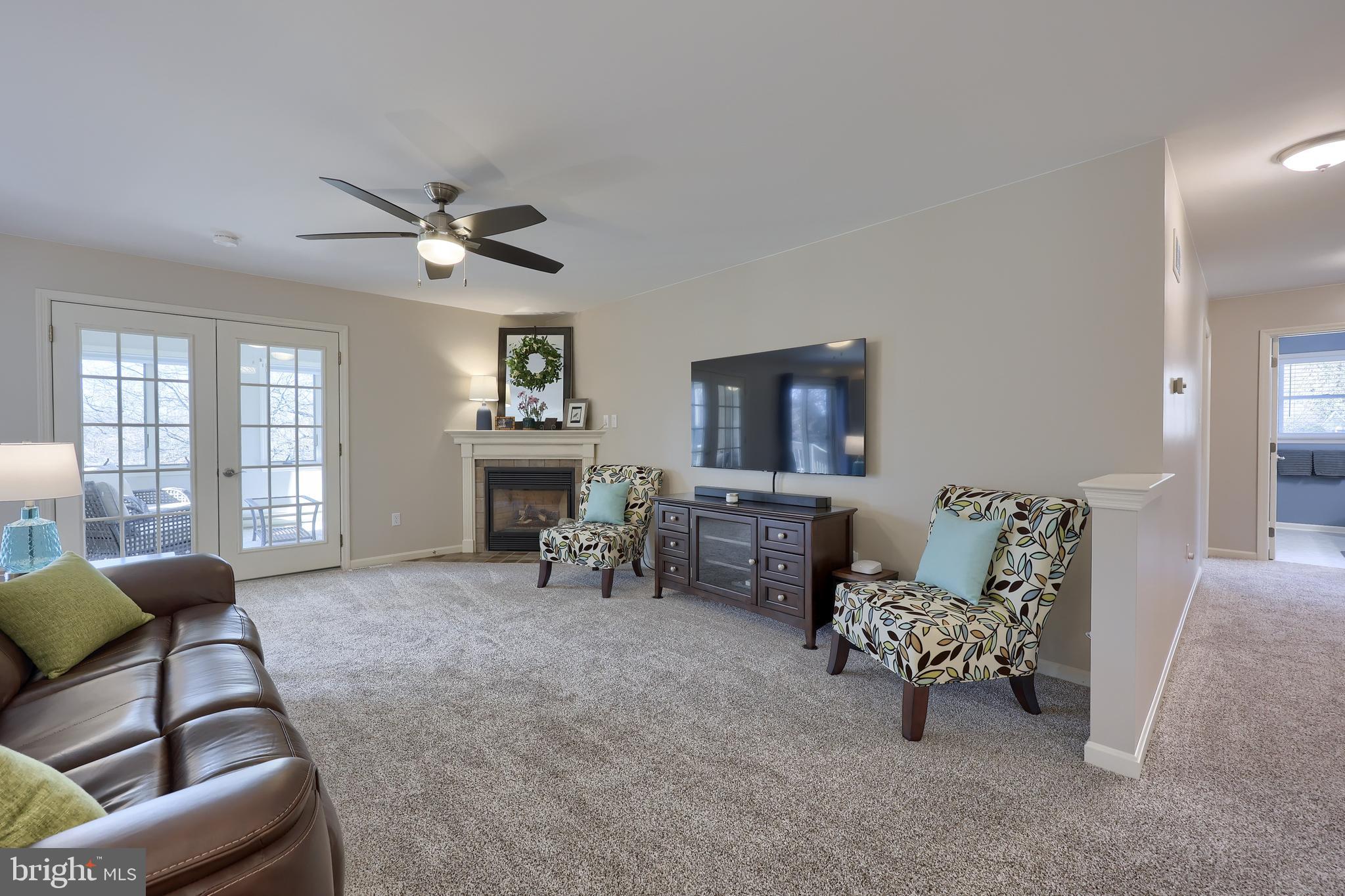 35 Field Lane Lititz, PA 17543 - Photo 8 of 49 a living room with furniture and a flat screen tv
