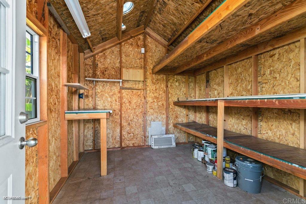 1453-1455 Thomas Avenue San Diego, CA 92109 - Photo 22 of 37 a view of a balcony with table and chairs