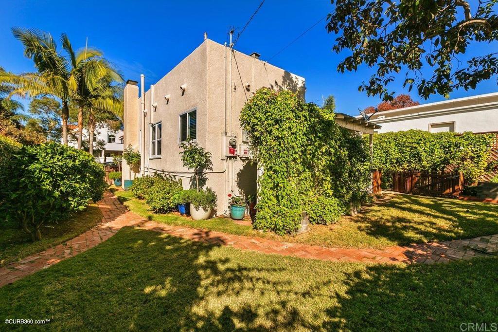 1453-1455 Thomas Avenue San Diego, CA 92109 - Photo 24 of 37 a view of outdoor space and garden