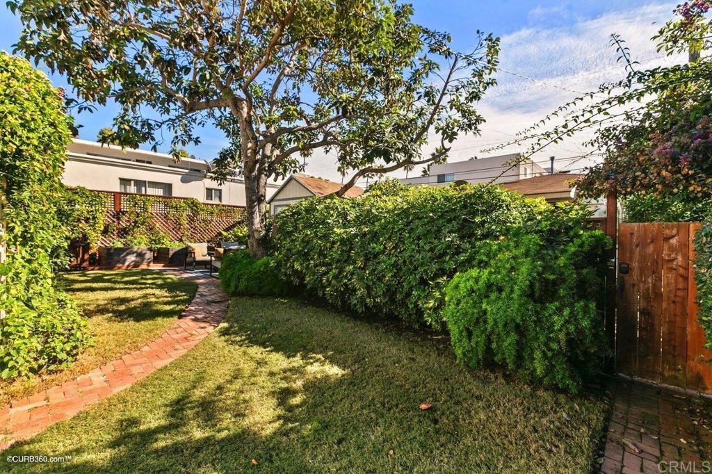 1453-1455 Thomas Avenue San Diego, CA 92109 - Photo 25 of 37 a view of yard with outdoor seating