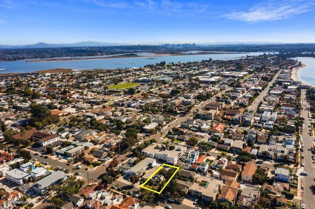 1453-1455 Thomas Avenue San Diego, CA 92109 - Photo 4 of 37 an aerial view of a building and ocean