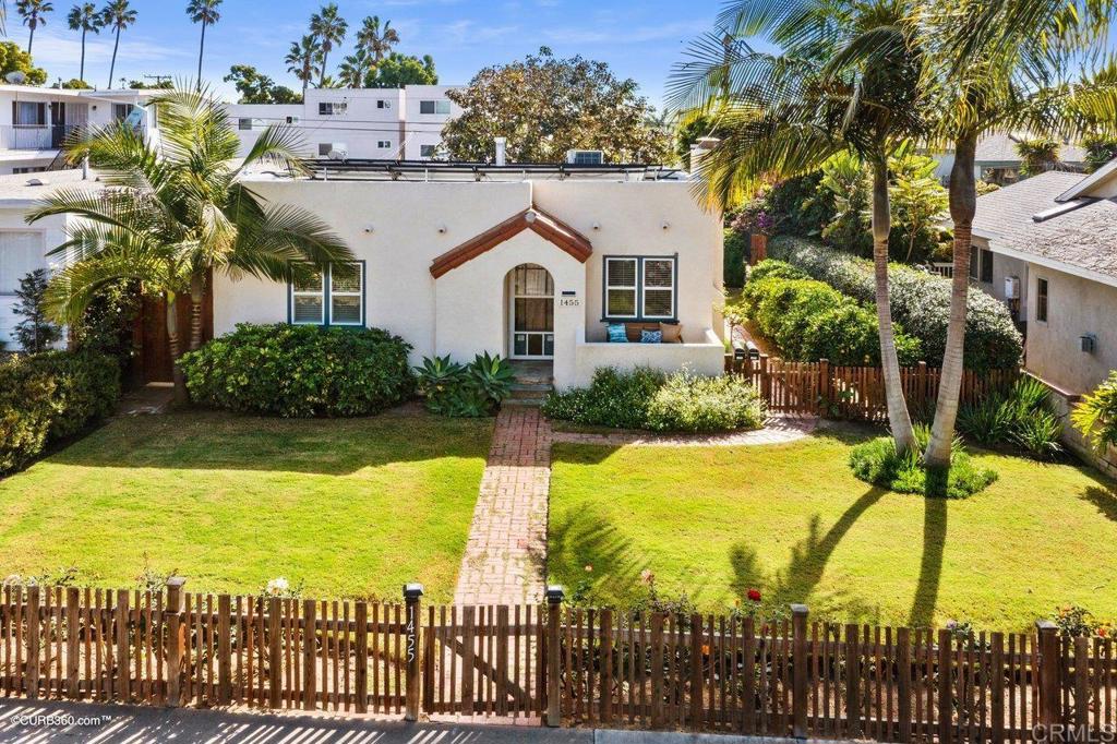 1453-1455 Thomas Avenue San Diego, CA 92109 - Photo 6 of 37 a view of a swimming pool with an outdoor space and seating area