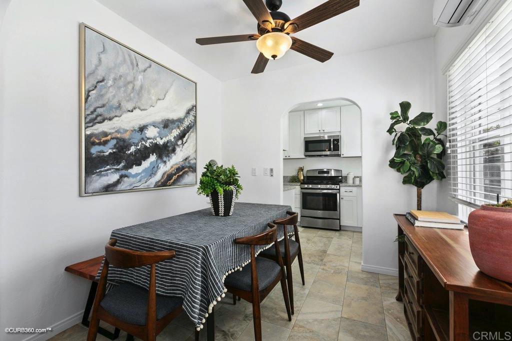 1453-1455 Thomas Avenue San Diego, CA 92109 - Photo 10 of 37 a dining room with furniture and window