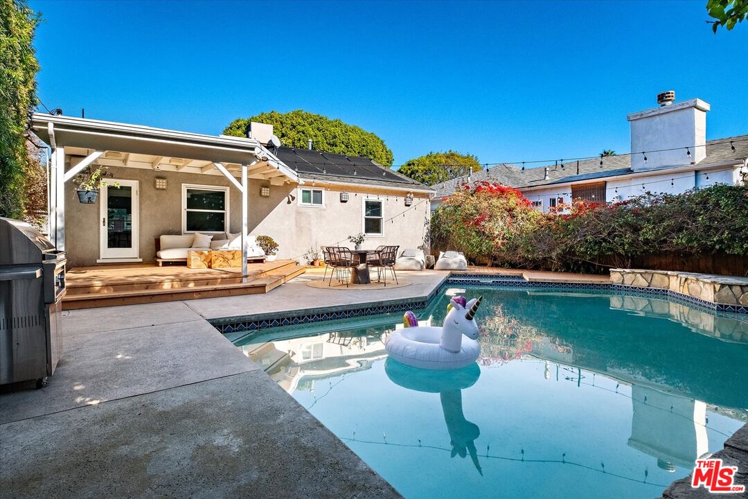 10944 Stever Street Culver City, CA 90230 - Photo 21 of 25 a view of a house with swimming pool and porch