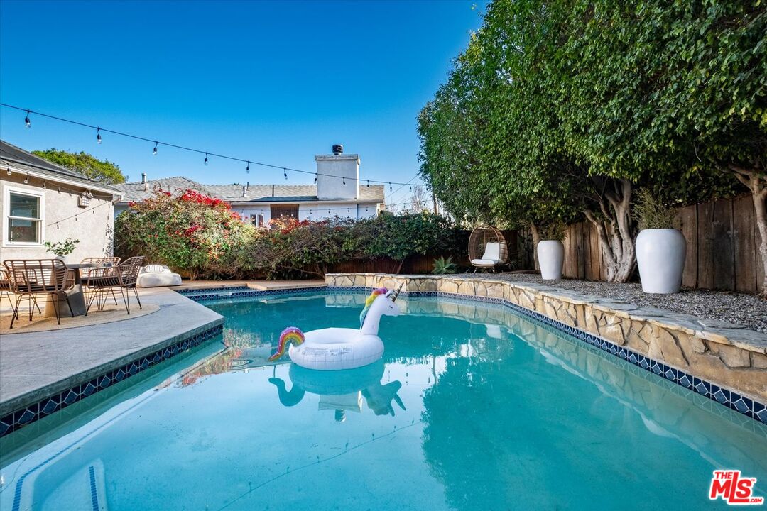 10944 Stever Street Culver City, CA 90230 - Photo 22 of 25 a swimming pool with outdoor seating and yard