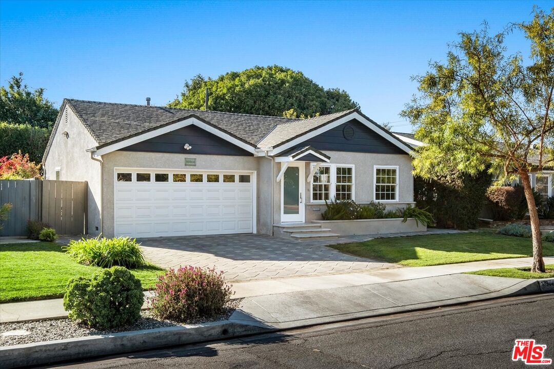 10944 Stever Street Culver City, CA 90230 - Photo 25 of 25 a front view of a house with a yard and garage